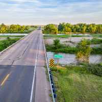 highway and bridge over the South Platte River in Nebraska at Brule, aerial view with summer scenery