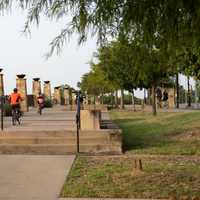 Dallas, TX / USA - August 20, 2020: People ridding bike in the White Rock Lake in summer