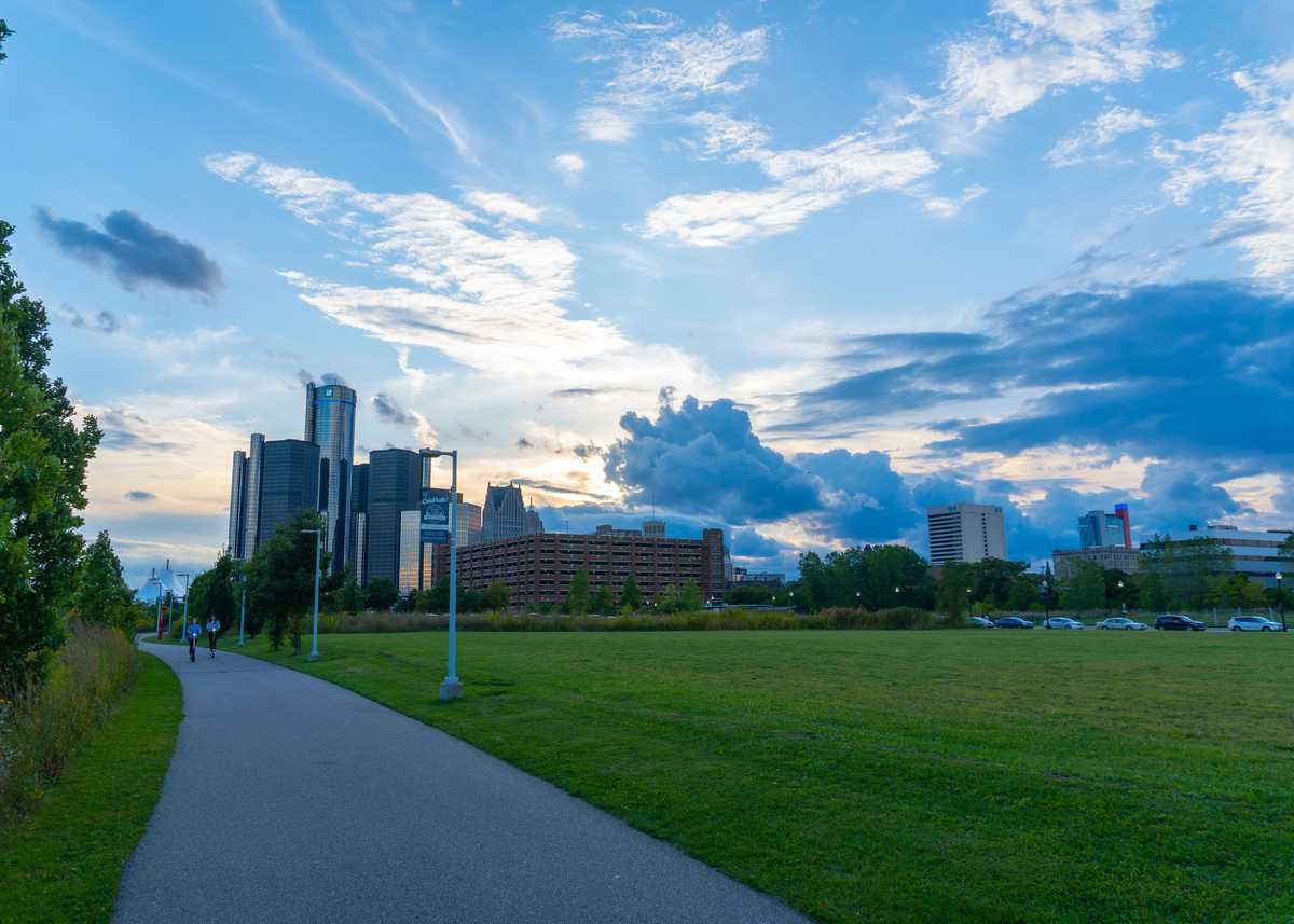 Detroit, MI - September 7, 2019: Detroit Riverfront bike path leading to the heart of downtown